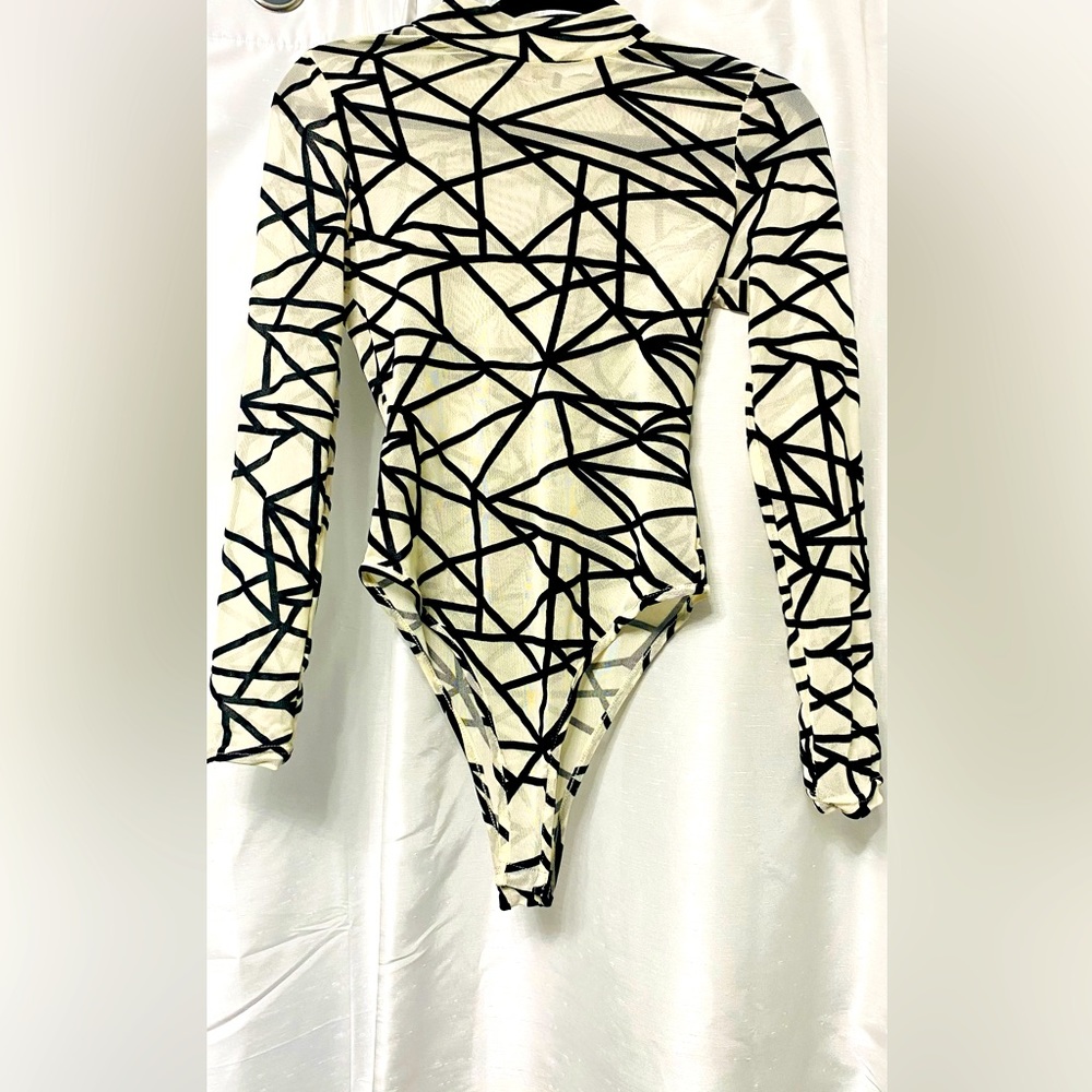 Women’s Mesh Body Suit Ivory/Combo. Small . Never worn